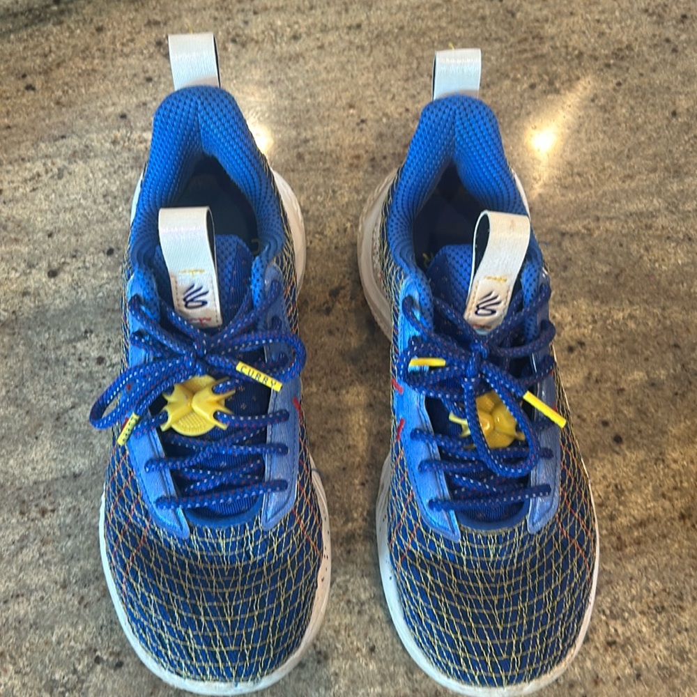 Blue and yellow Curry sneakers